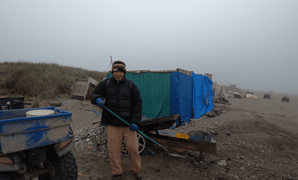 prospecting for gold on Nome beach